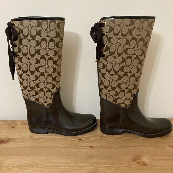 Coach women’s brown Tristee lace up boots